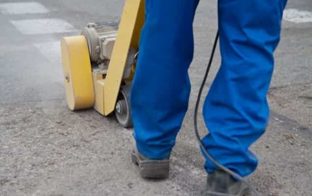 Using a scarifier will “grind” off the parking lot lines.